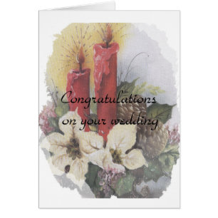 Christmas candles, pinecone with white poinsettias