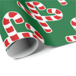 Christmas candy cane heart wrapping paper<br><div class="desc">Christmas candy cane heart wrapping paper. Cute Xmas giftwrap with cancycanes in love heart shape. Custom background colour. ie red and green. Winter Holiday gift wrap.</div>