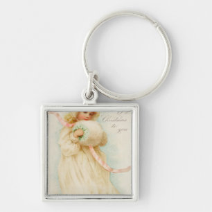 Christmas card depicting a girl with a muff key ring