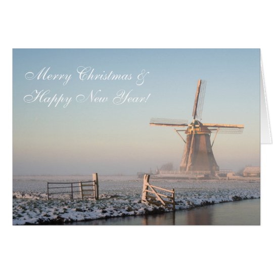 Christmas card windmill in winter at sunrise