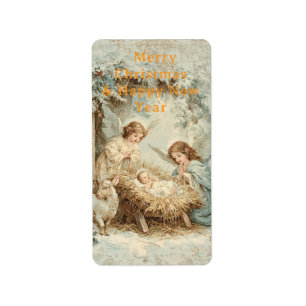 Christmas card with baby Jesus in a manger and ang Label