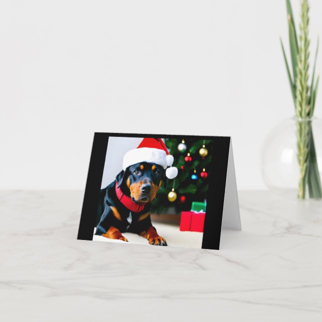 Christmas card with Rottweiler wearing Santa hat (Front)