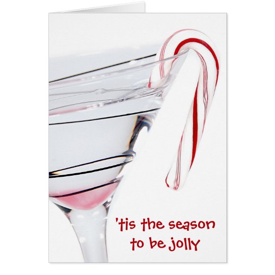 Christmas cocktail with candy cane on white card