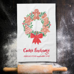 Christmas Cookie Exchange Party Tea Towel<br><div class="desc">This cute and charming kitchen towel will be perfect for your Cookie Exchange party. It is printed with a decorative watercolor of a festive wreath of Christmas cookies. Give it as a party favour. Customise this kitchen towel with your name and year. Enjoy the holiday fun! Original Watercolor © Michele...</div>