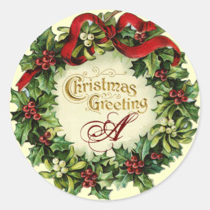 CHRISTMAS CROWN WITH MISTLETOES AND HOLLY BERRIES CLASSIC ROUND STICKER