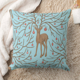 Christmas deer on blue cushion
