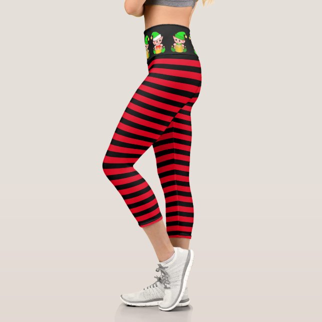 Christmas elf on red and black striped capri leggings (Left)