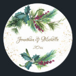 Christmas Evergreen Red Berry Winter Wedding Classic Round Sticker<br><div class="desc">Elegant Christmas Wedding sticker depicts simple watercolor evergreen branches adorned with holly leaves,  red berries and gold splashes. Good choice for winter and Christmas weddings._</div>