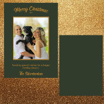 Christmas Family Photo Dark Green Gold Flat Card<br><div class="desc">Capture the magic of the holiday season with this beautifully personalised flat Christmas card that features your favourite family photo with a gold frame on a dark forest green background. All text is a deep gold. The rich, forest greens and golden hues create a warm, nostalgic atmosphere. "Merry Christmas" is...</div>