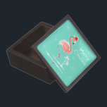 Christmas Flamingo Merry Christmas premium Jewellery Box<br><div class="desc">Stylish design with a retro touch featuring a festive pink flamingo wearing a red Santa hat, stars and palm trees decorated with baubles set against an aqua background. A customisable design for you to personalise with your own text, images and ideas. An original digital art image created by Quirky Chic....</div>