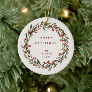 Christmas foliage wreath with red bow ceramic ornament