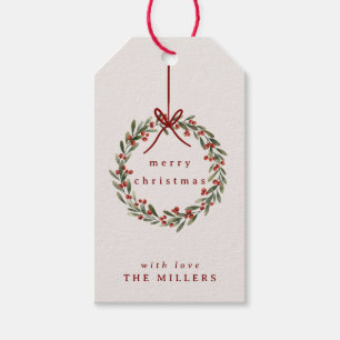Christmas foliage wreath with red bow  gift tags