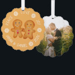 Christmas Gingerbread Couple Photo Snowflakes Cute Tree Decoration Card<br><div class="desc">A Christmas design: a pair of cute little gingerbread figurines -a gingerbread man and woman - holding hands, on light brown background, surrounded by arched text with white snowflakes between words. The message above is Peace Love Joy, below there is the names and year. On the back there is a...</div>