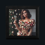 Christmas Glamour Gift Box<br><div class="desc">A stunning brunette woman exudes holiday cheer in a unique, eye-catching dress adorned with shimmering gold fabric and a cascade of colourful Christmas ornaments. Holding a champagne flute with a delicate hand, she stands confidently before a brightly lit Christmas tree, her captivating gaze meeting the viewer's eye.</div>