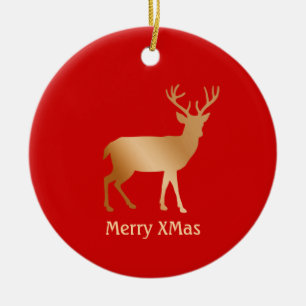 Christmas golden reindeer on red ceramic ornament