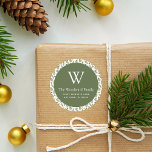 Christmas Greenery Pattern Address Classic Round S Classic Round Sticker<br><div class="desc">This festive Christmas return address sticker features an olive green circle on a watercolor pattern of winter greenery, including evergreen pine trees and holly sprigs with red berries, on a white background. Personalise the design with your monogram initial and family name in white serif font, with your address below in...</div>