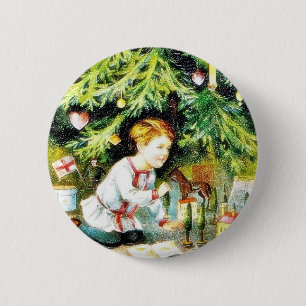 Christmas greeting with a boy playing under the de 6 cm round badge