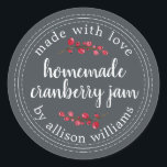 Christmas Homemade Cranberry Jam Canning Classic Round Sticker<br><div class="desc">Rustic and modern homemade Christmas jam canning cranberry jam jar sticker with the text made with love, homemade cranberry jam and your name in white chic script calligraphy and modern typography on an off-black background with a stylish touch of cranberries. Simply add your name and the product name to the...</div>
