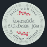 Christmas Homemade Cranberry Jam Canning Green Classic Round Sticker<br><div class="desc">Rustic and modern homemade Christmas jam canning cranberry jam jar sticker with the text made with love, homemade cranberry jam and your name in modern script on a pastel green background with a stylish touch of cranberries. Simply add your name and the product name to the label. Exclusively designed for...</div>