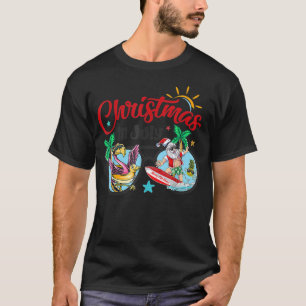 Christmas In July Beach Flamingo Santa Surfing Sun T-Shirt