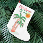 Christmas in July Christmas Stocking<br><div class="desc">Are you celebrating Christmas in July this year?
Add this island style Christmas Stocking to your party decor.
It is decorated with watercolor palm trees decorated like Christmas trees and a sun.
Original Watercolor © Michele Davies.</div>