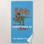 Christmas in July Dinosaur Funny Personalised Beach Towel<br><div class="desc">A personalised family Christmas in July design that you can put your own family last name or custom text on to make it unique! Great for a Christmas in July summer party, BBQ, or pool party, this design features a T-Rex dinosaur chomping down on a gingerbread man cookie with the...</div>