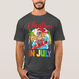 Christmas In July Funny Summer Santa Surfing Beach T-Shirt
