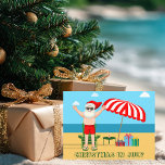 Christmas in July Party Summer Santa Claus Beach Postcard<br><div class="desc">This cute Christmas in July postcard makes a perfect summer party invitation for a beach bash or pool gathering. Make it a fun north pole themed extravaganza with Santa Claus in his swimming trunks next to a red and white striped beach umbrella and gifts. I've never seen Mr. Klaus in...</div>
