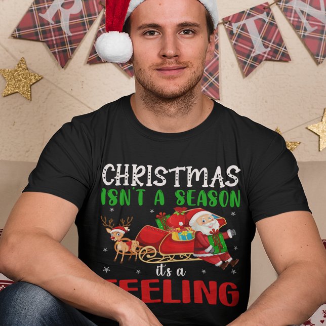 Christmas Isn’t a Season It’s a Feeling  T-Shirt (Creator Uploaded)
