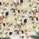 Christmas Joy Snowflake Photo Collage Pale Gold Wrapping Paper<br><div class="desc">'Wishing you joy' fun and stylish gift wrap! An editable template, personalised with six photos of your family, friends or pets. You can also include the recipient's name, your family name or the holiday year. A seamless pattern with snowball framed photographs, festive leaves, berries, snow, snowflakes and stars. Custom gift...</div>