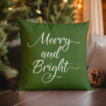 Christmas Merry and Bright Red Green Cushion<br><div class="desc">Reversible minimal design with "Merry and Bright" in modern white script typography against a forest green background on one side and a burgundy red background on the other side.</div>