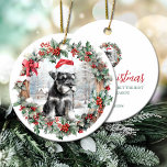 Christmas miniature schnauzer dog puppy Santa hat Ceramic Ornament<br><div class="desc">Cute Christmas ornament with a sweet miniature schnauzer dog puppy in a Santa hat in Christmas holly and berry wreath. Personalised dog,  puppy,  cute animal Christmas ornament (text on the back).</div>