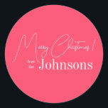 Christmas Modern Pink Family Classic Round Sticker<br><div class="desc">This is a stylish, Merry Christmas design. It is in trending modern pink and white and has the message, "Merry Christmas! from the Johnsons". Ideal for your Christmas gift wrap, mailing accessories. envelope seals, and party favour seals this festive season. To personalise, simply add your name in the personalise this...</div>