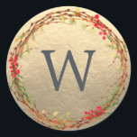 Christmas Monogram Winter Greenery Wreath Gold Classic Round Sticker<br><div class="desc">Rustic monogrammed winter greenery leaves berries wreath Christmas gold envelope seal or gift sticker. Simply customise the Christmas label by adding your monogram initial. Modern and simple,  red and green Christmas theme. Exclusively designed for you by Happy Dolphin Studio. If you need any help please contact us at happydolphinstudio@outlook.com.</div>