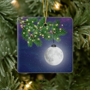 Christmas Moon Ornament Hanging From Pine Bough
