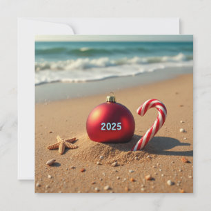Christmas ornament on the beach holiday card