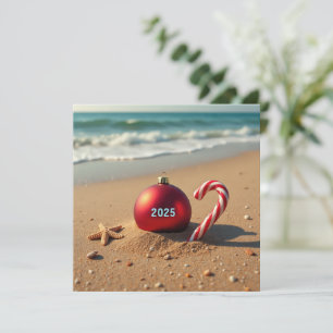 Christmas ornament on the beach holiday card