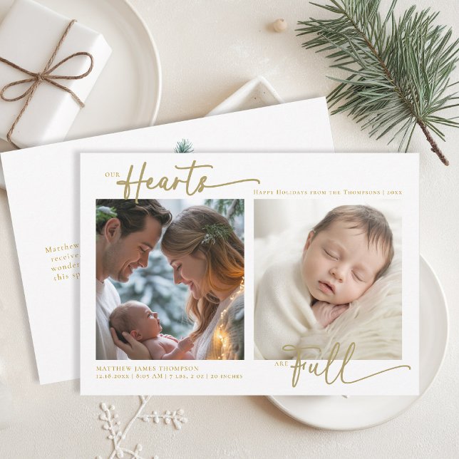 Christmas Our Hearts Gold Family Baby 2 Photos Holiday Card (christmas family card baby announcement card chic calligraphy simple elegant 2 photos gold)