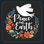 Christmas Peace on Earth Script Square Sticker<br><div class="desc">A pretty Christmas sticker featuring a dove in a floral wreath with the words Peace on Earth in an elegant script font. The Christmas sticker is designed in black,  white and red. Designed for you by Blackberry Boulevard.</div>
