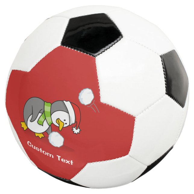 Christmas penguin getting a snow ball (Three Quarter)