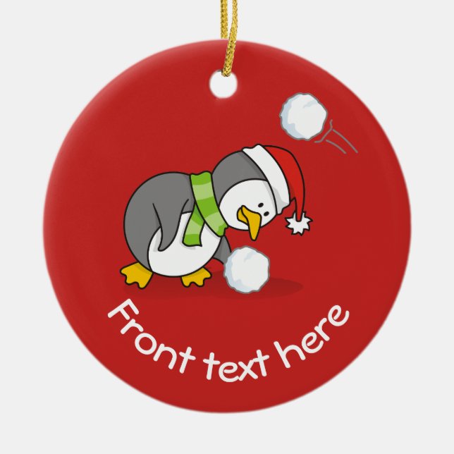 Christmas penguin getting a snow ball ceramic ornament (Front)