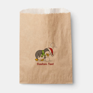 Christmas penguin getting a snow ball favour bag