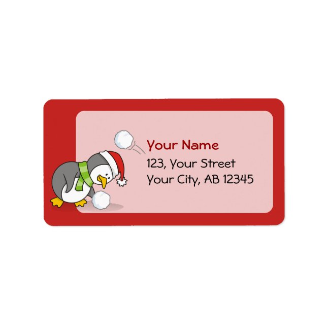 Christmas penguin getting a snow ball label (Front)