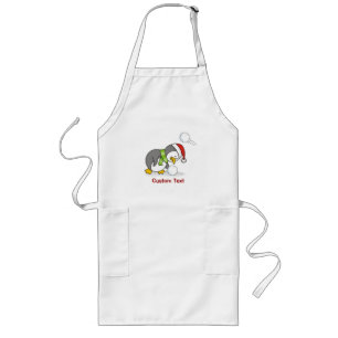 Christmas penguin getting a snow ball long apron