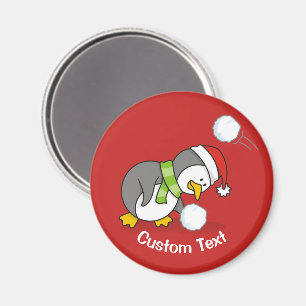 Christmas penguin getting a snow ball magnet