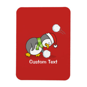 Christmas penguin getting a snow ball magnet