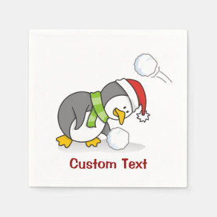 Christmas penguin getting a snow ball napkin