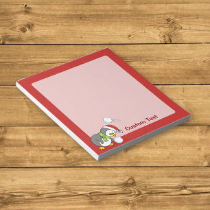 Christmas penguin getting a snow ball notepad