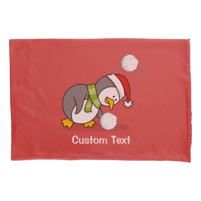 Christmas penguin getting a snow ball pillowcase (Front)