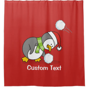 Christmas penguin getting a snow ball shower curtain